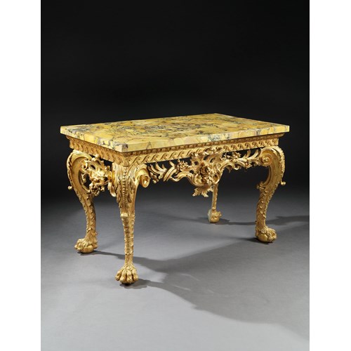 A GEORGE II GILTWOOD SIDE TABLE IN THE MANNER OF MATTHIAS LOCK